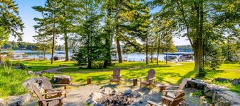 Newly-built condo on Duck Lake with decks, private dock, & firepit