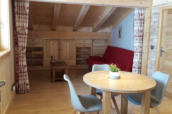 Vue espaces salle Ă manger et salon