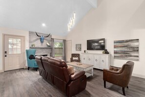 Smart TV, fireplace, books