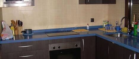 Microwave, dishwasher, coffee/tea maker, cookware/dishes/utensils