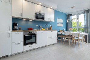 Fridge, microwave, oven, stovetop - Spacious Apartment | Two Bedrooms, Balcony and Parking (Kolobrzeg)