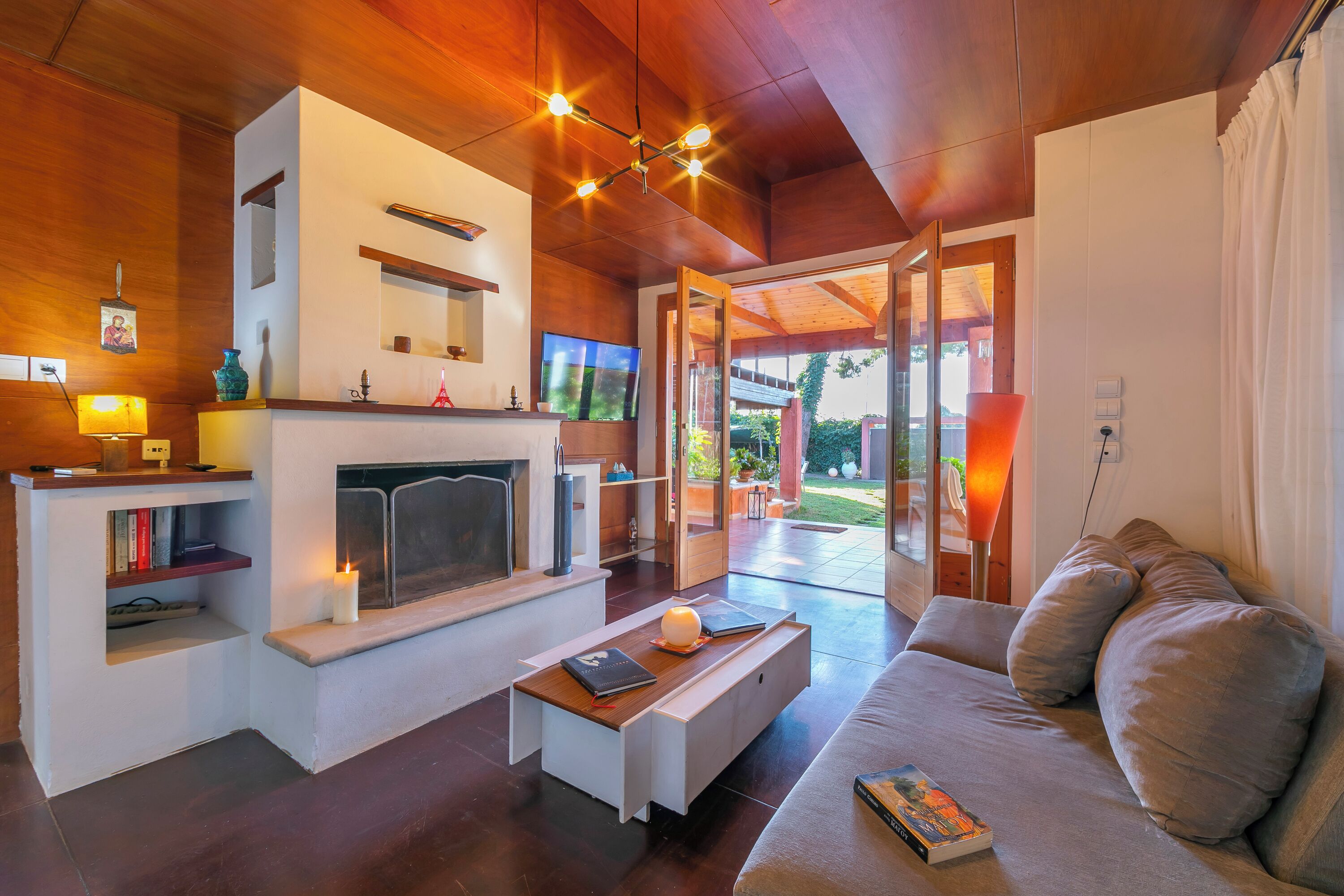 Family Villa, Multiple Bedrooms, 2 Bathrooms (Villa Revita Kourouta beach) | Living area | 21-inch flat-screen TV with satellite channels, TV, fireplace