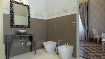 Bathtub, jetted bath, bidet, towels