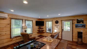 Signature Cabin, Mountain View | Living area | 50-inch TV with cable channels