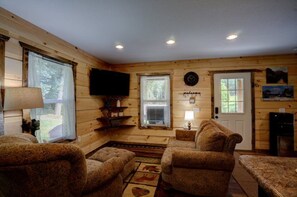 Signature Cabin, Mountain View | Living area | 50-inch TV with cable channels