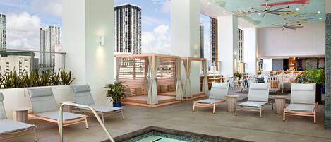 Outdoor pool, open 7:00 AM to 7:00 PM, pool loungers