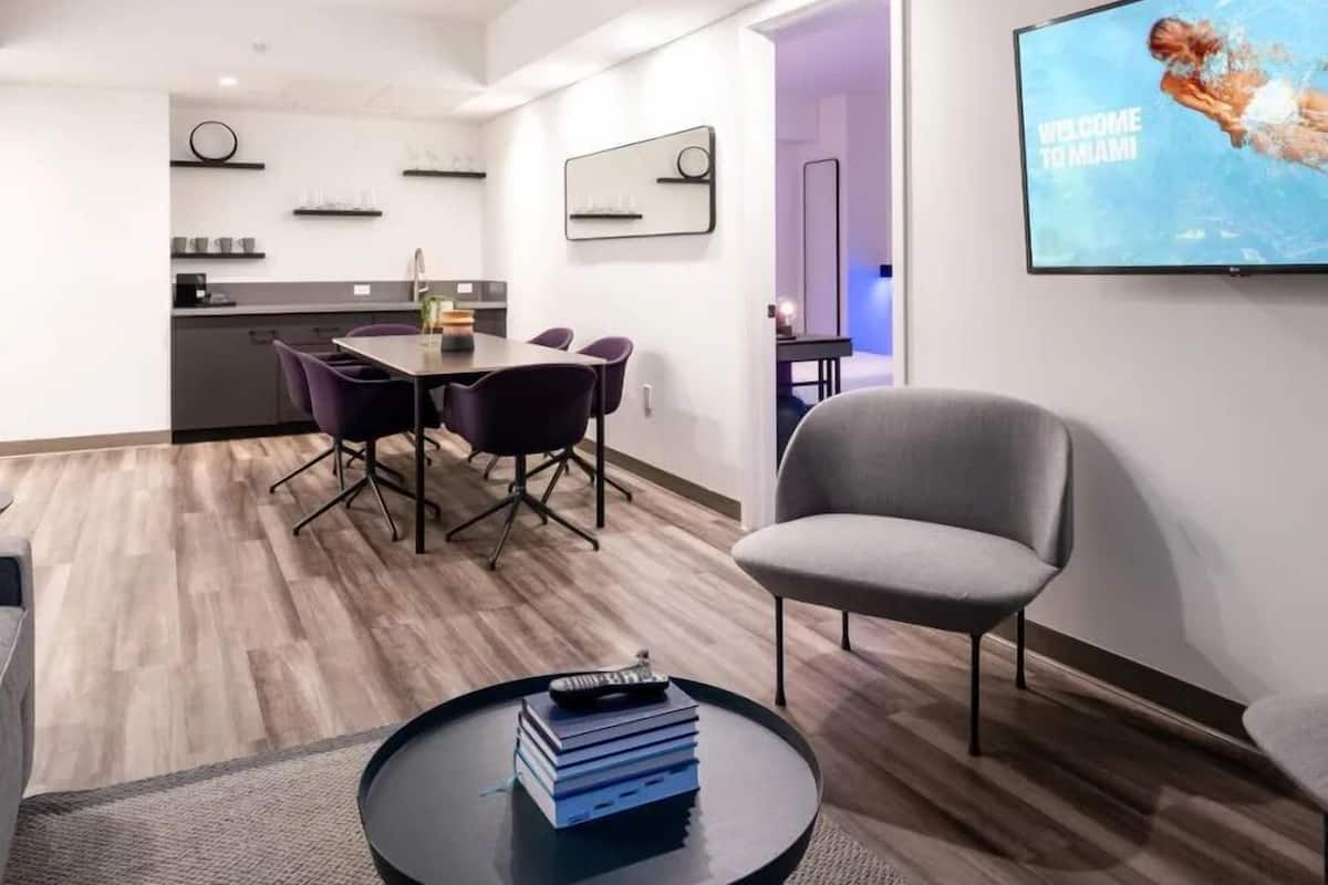 Suite, 1 Bedroom | Living area | Flat-screen TV