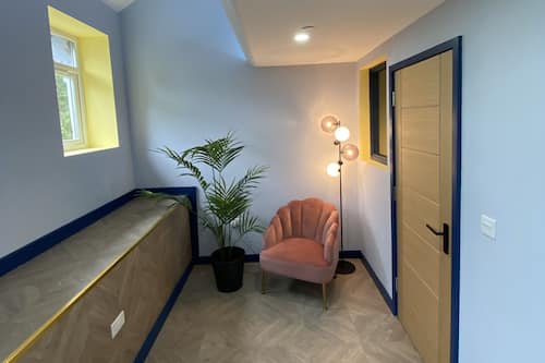 Appartement Deluxe | Coin séjour | TV connectée, Netflix, services de streaming