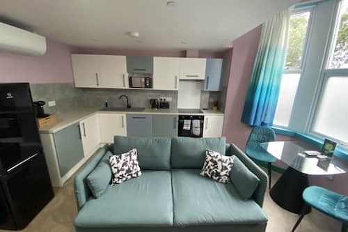 Deluxe appartement | Woonkamer | Smart-tv, Netflix en streamingdiensten