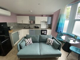 Lägenhet Deluxe | Vardagsrum | Smart-tv, Netflix och streamingtjänster