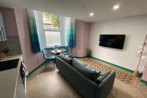 Deluxe appartement | Woonkamer | Smart-tv, Netflix en streamingdiensten