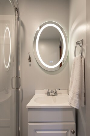 Bathtub, hair dryer, towels
