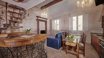 Premium Apartment | Living area | Flat-screen TV