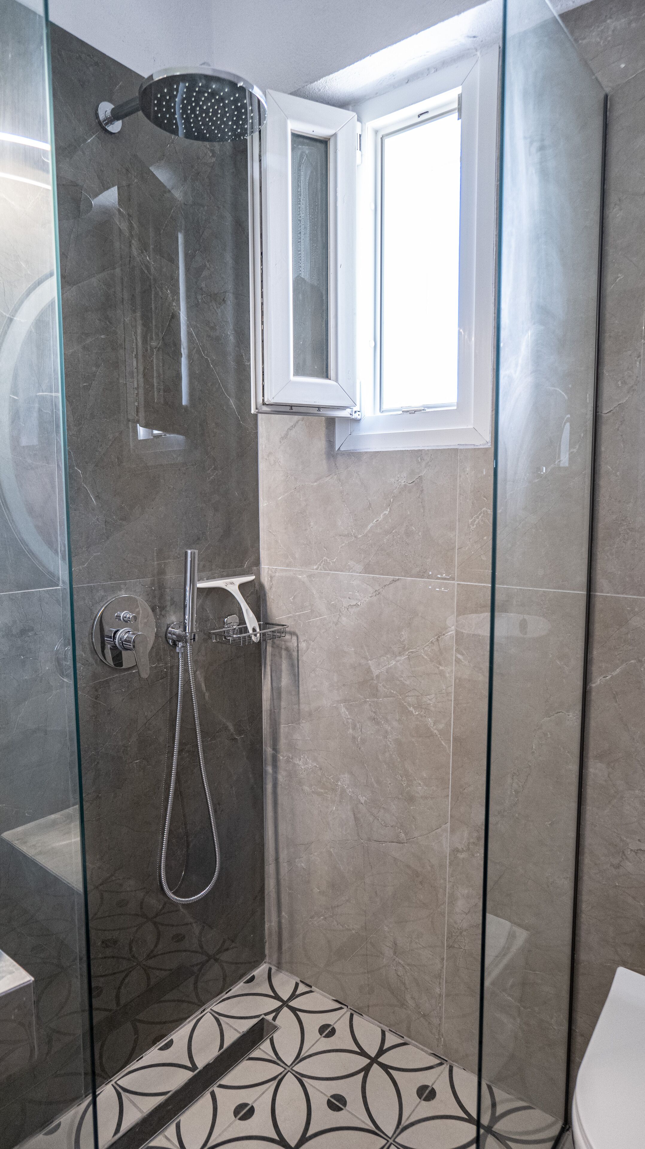 Shower, hair dryer, towels, toilet paper