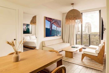 2 Bedroom Suite | Living area | 50-inch flat-screen TV with digital channels, TV at Flow Fort Lauderdale Hotel