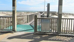 A wooden boardwalk leading to a beach with a 'Leave Only' sign. - A409 King/Twin bunk & Full bed/ Sofa Sleeper-Beach Front-Pools - sleeps 8 (Gulf Shores)