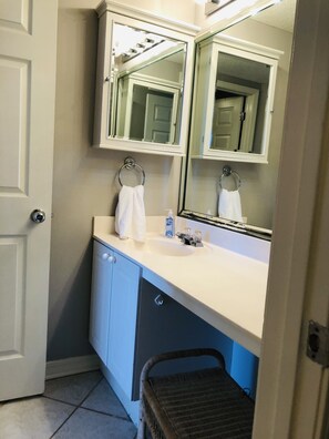 Combined shower/tub, hair dryer, towels, soap