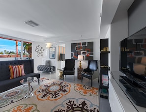 Premier Room | Living area | 46-inch TV with cable channels