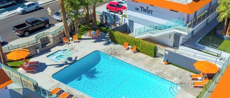 Outdoor pool, pool umbrellas, sun loungers