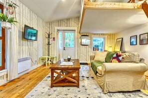 TV connectée, cheminée, Netflix, livres