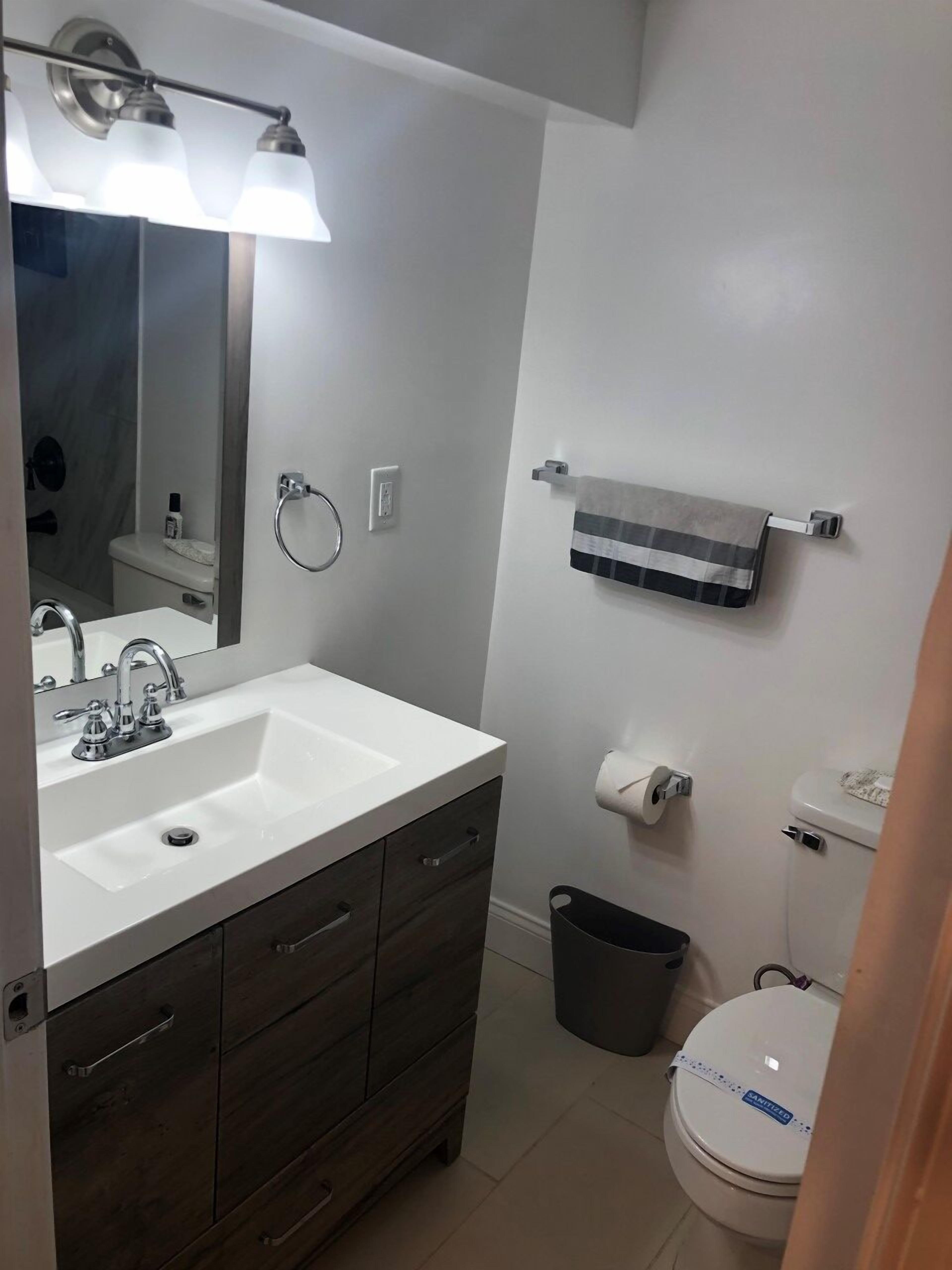 Combined shower/tub, hair dryer, towels, soap