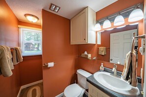 Combined shower/tub, hair dryer, towels, soap