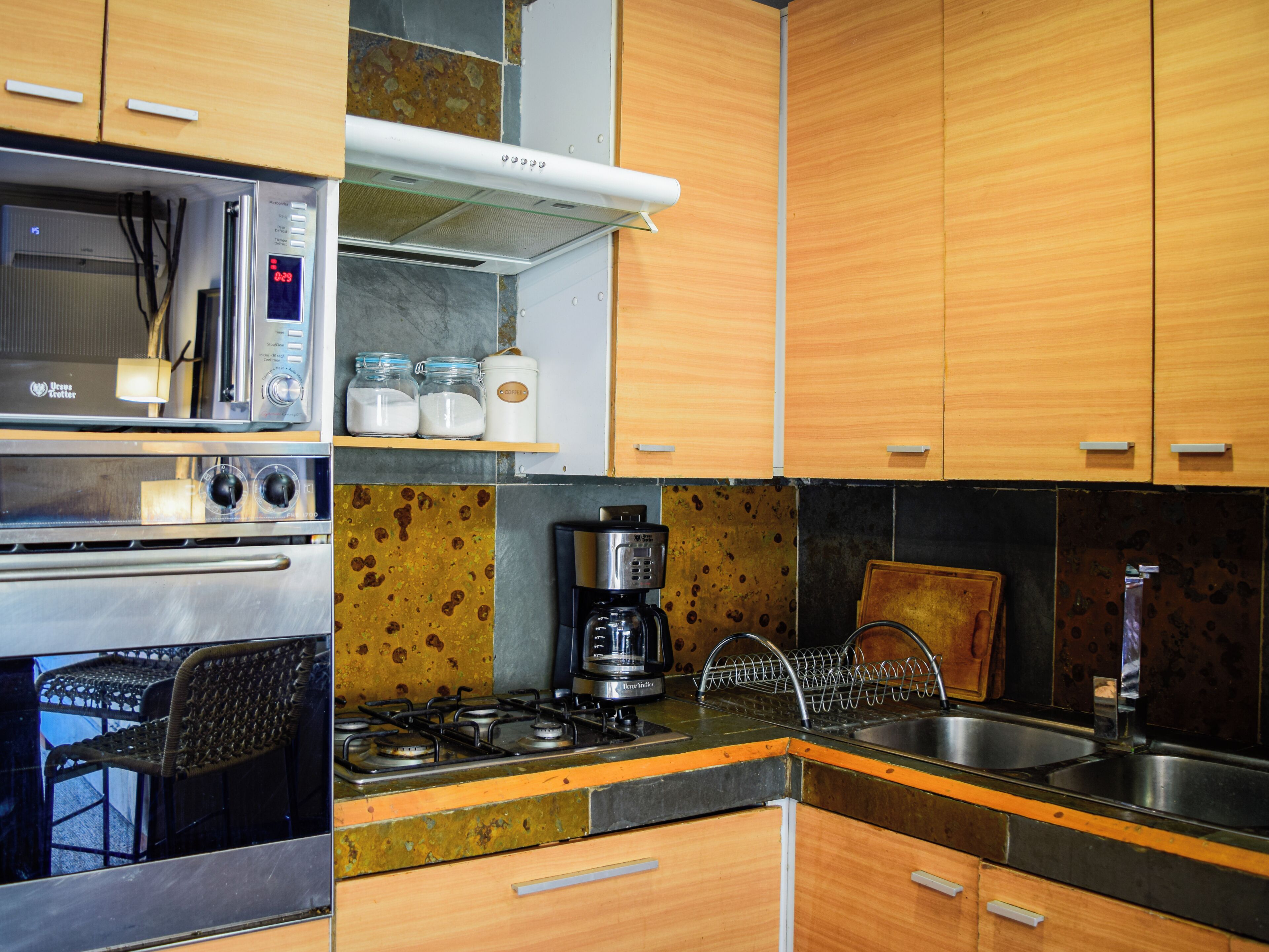 Coffee/tea maker, fridge, microwave, oven