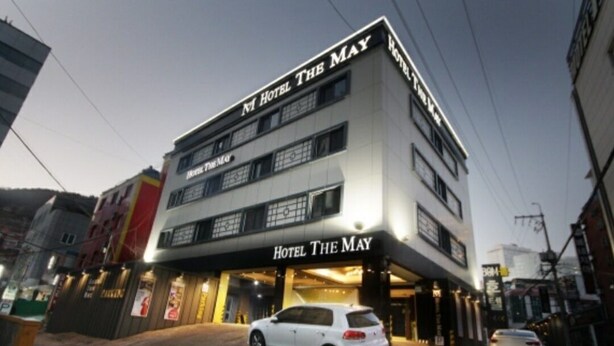 A multi-story hotel with signage for "Hotel The May" and "Motel The May." - Hotel The May (Busan)