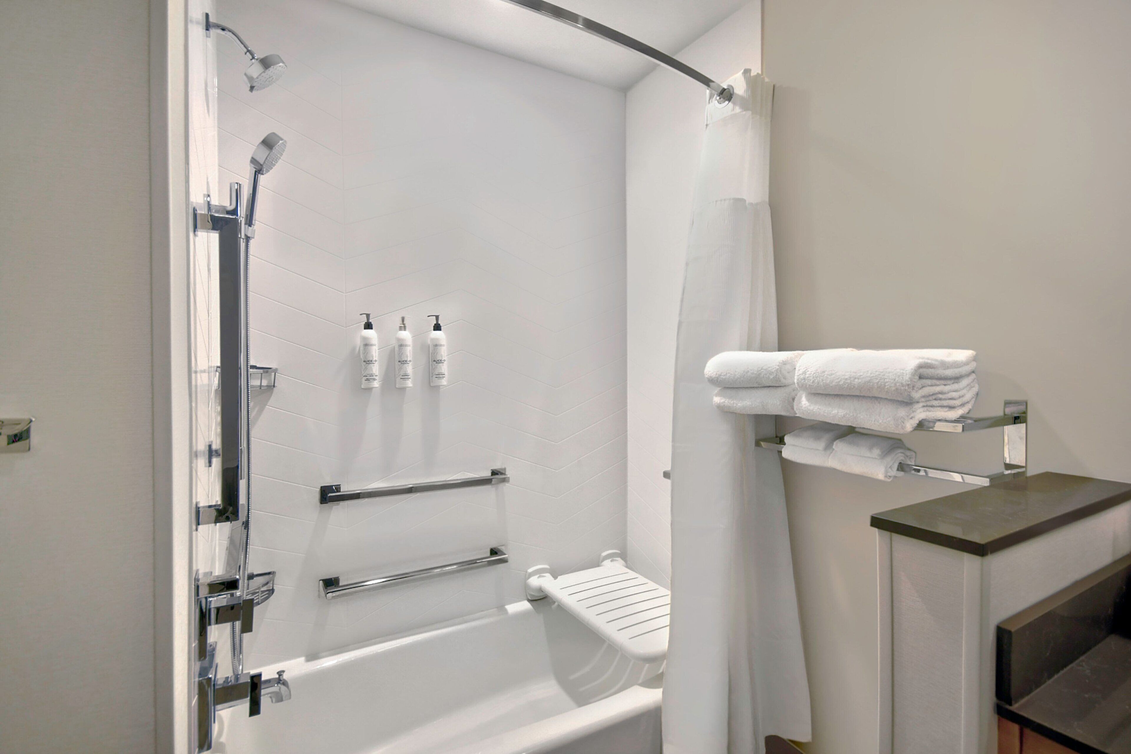 hair dryer, towels, soap, shampoo