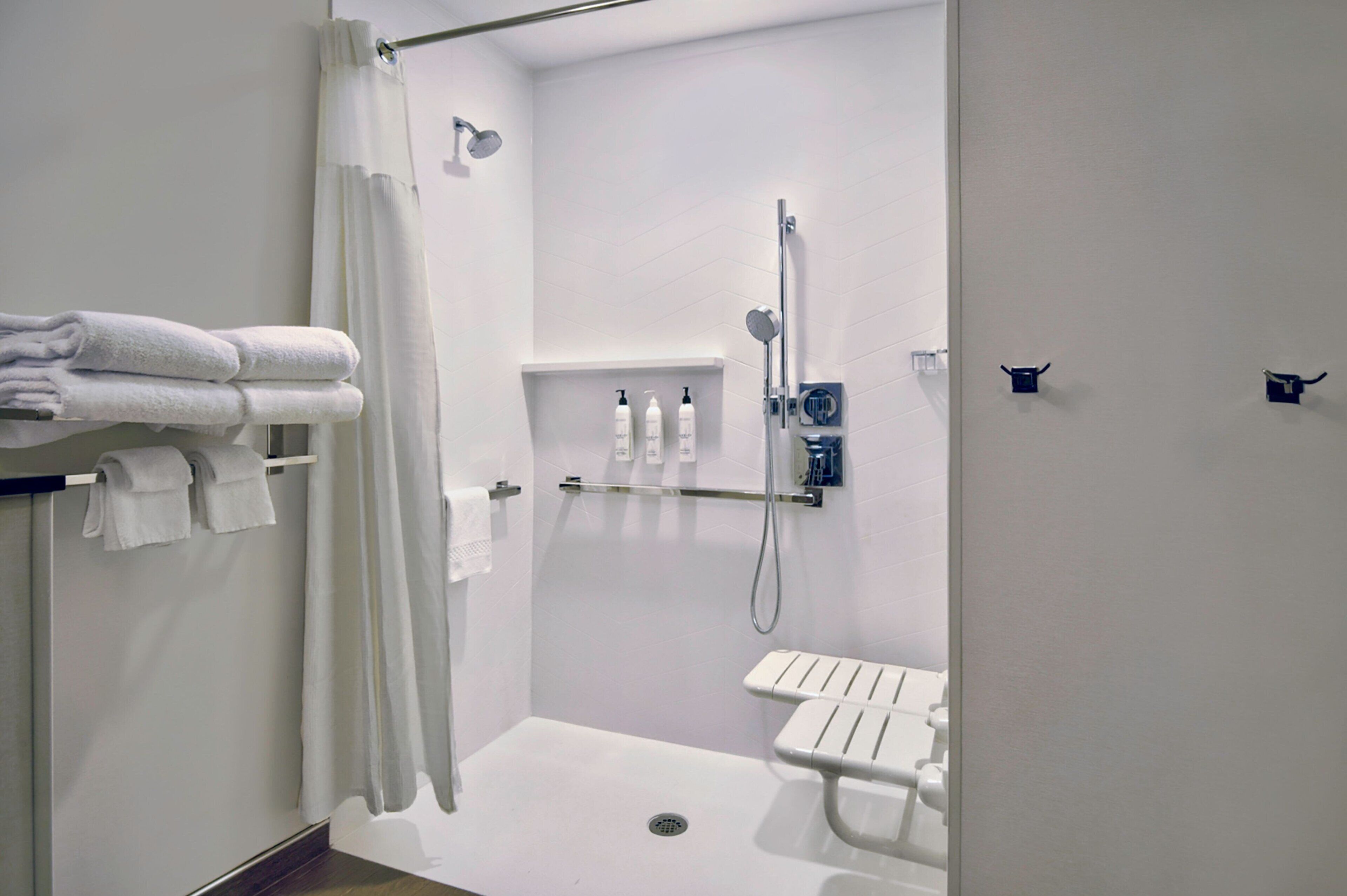 hair dryer, towels, soap, shampoo