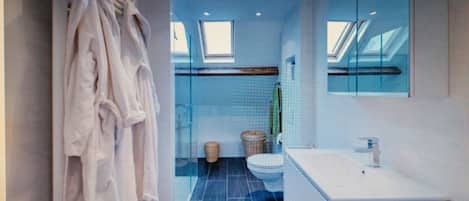 Shower, hair dryer, towels, soap