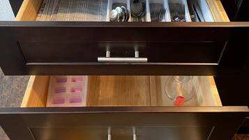 Fridge, stovetop, dishwasher, coffee/tea maker