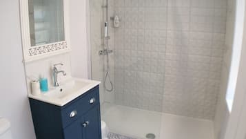 Shower, hair dryer, soap, shampoo