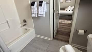 Combined shower/bathtub, hair dryer