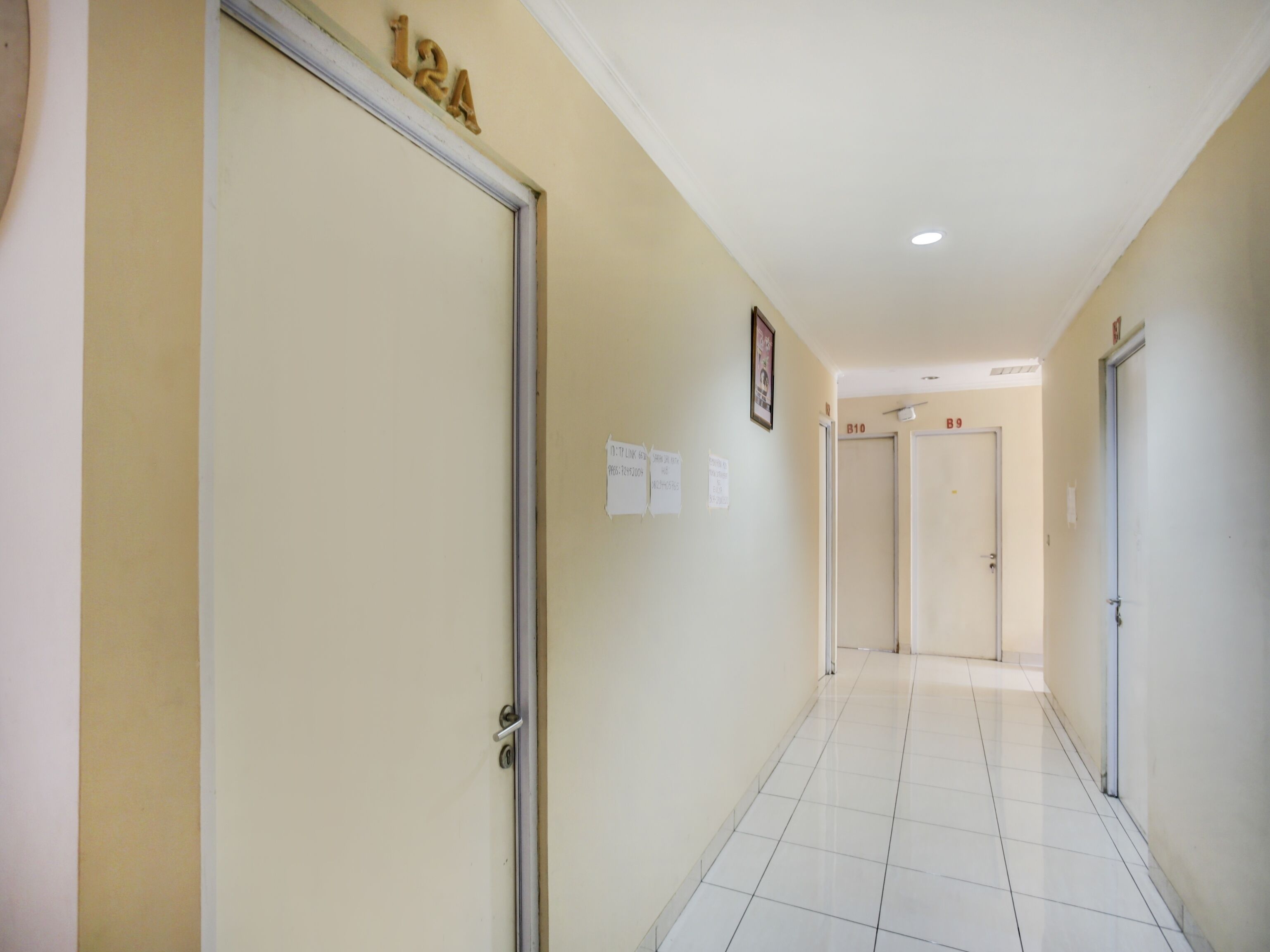 A hallway with doors labeled "B10" and "B9".