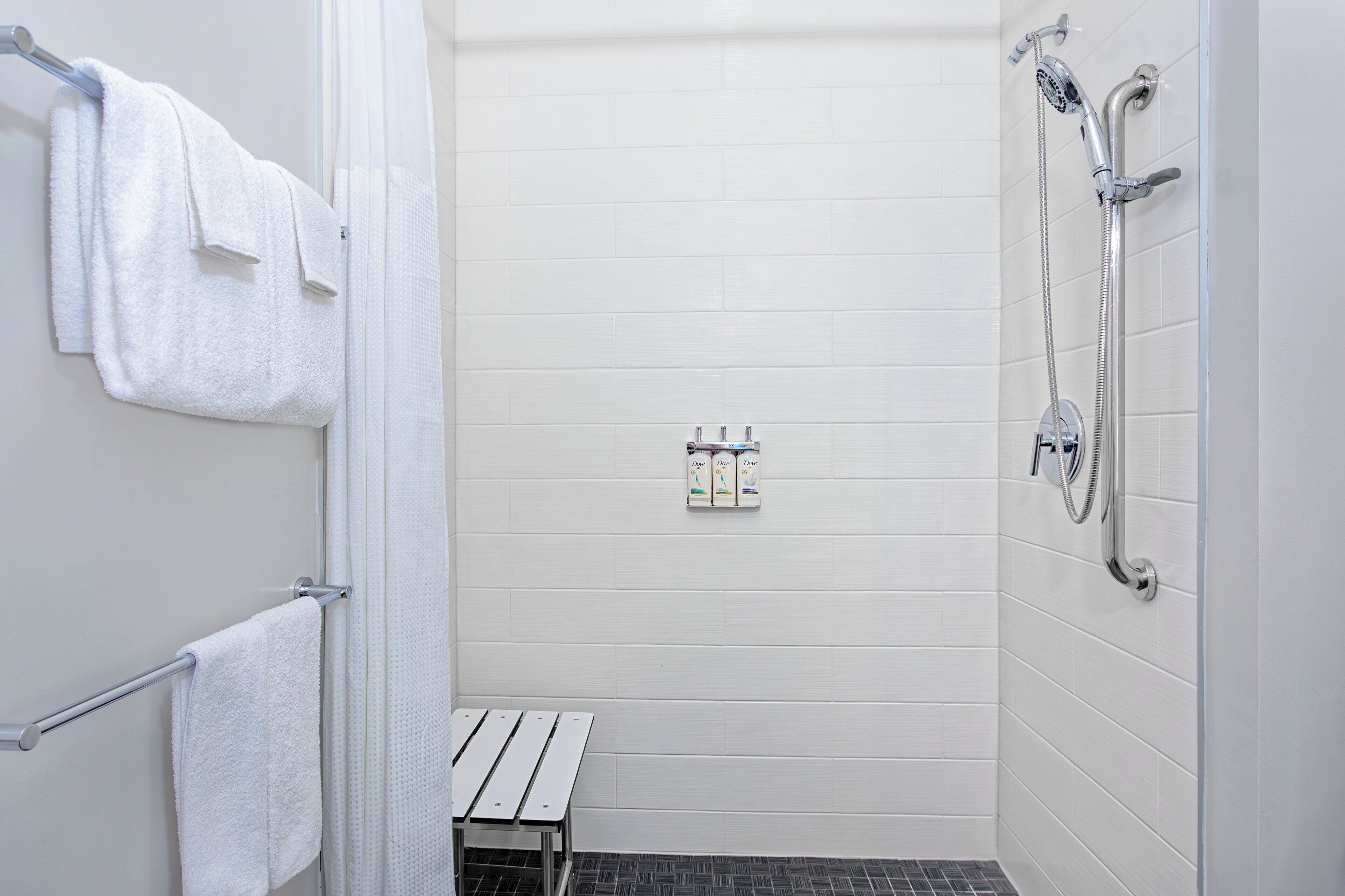 hair dryer, towels, soap, shampoo