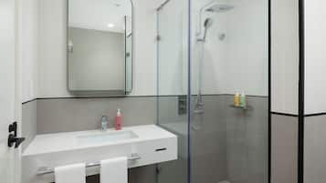 Shower, rainfall showerhead, hair dryer, towels