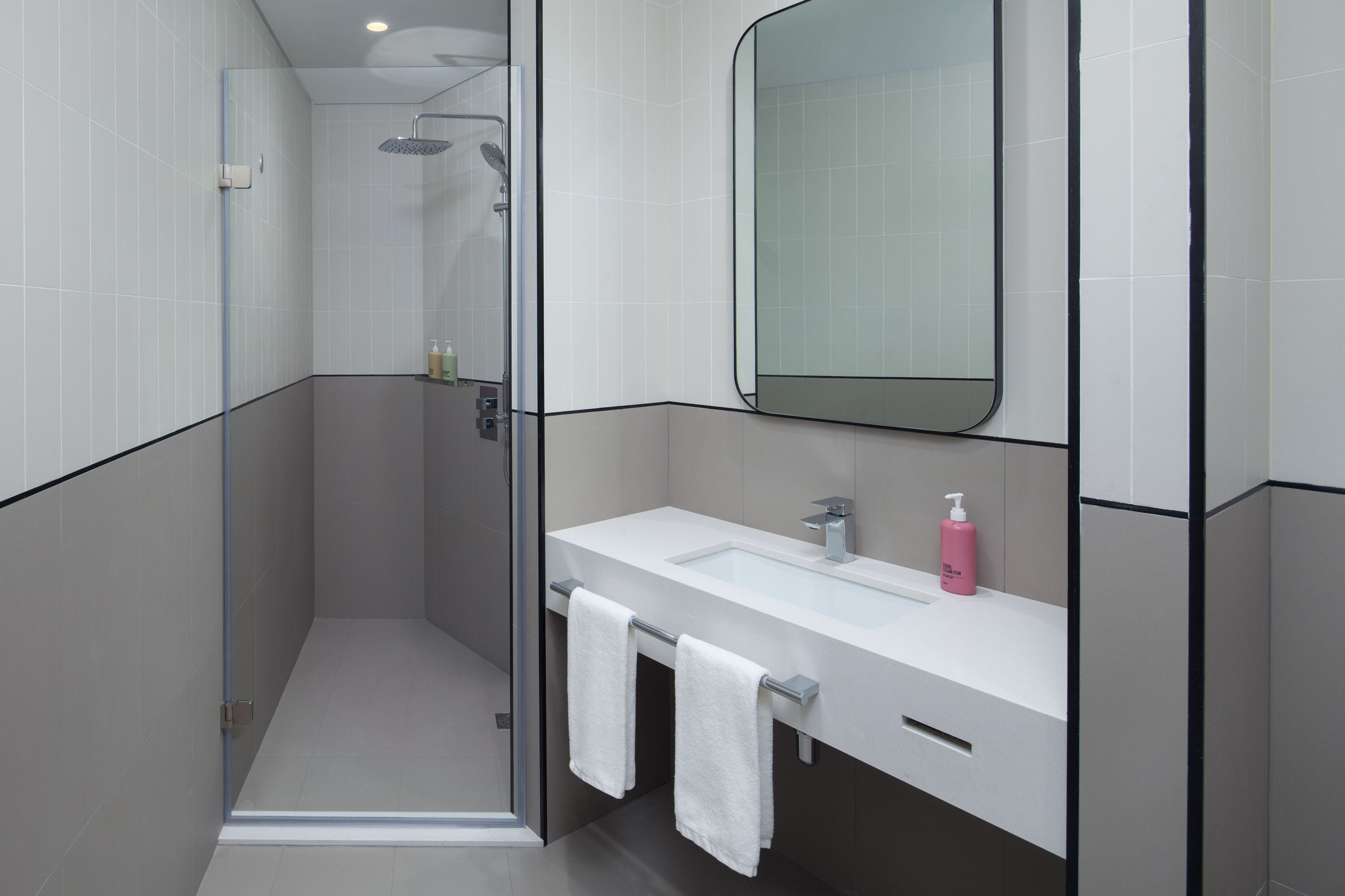 shower, rainfall showerhead, hair dryer, towels