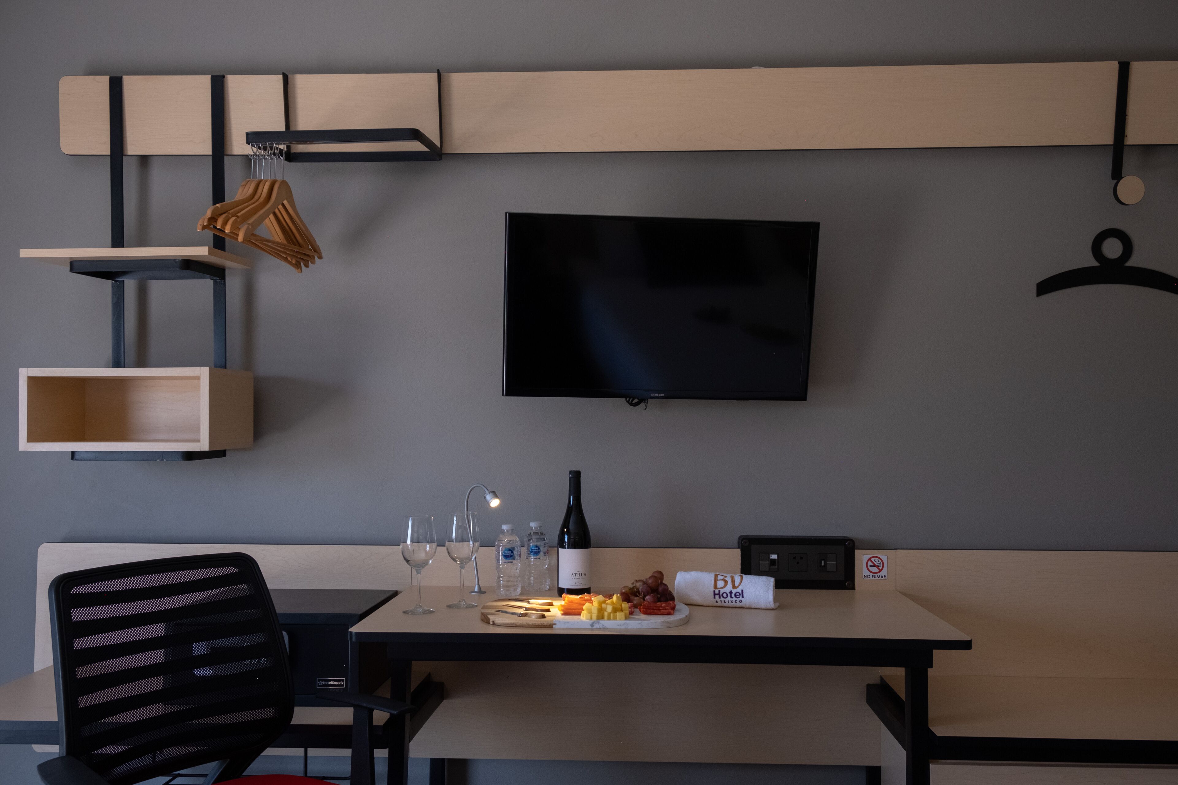 standard quadruple room | in-room safe, desk, laptop workspace, iron/ironing board