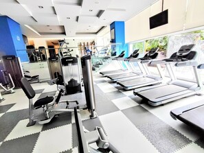 Stay active in our fully equipped gym with treadmills, weight machines, and free weights.