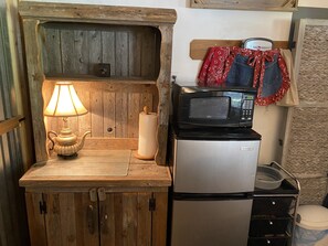 Fridge, microwave, coffee/tea maker, dining tables