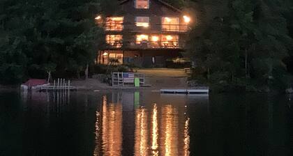 Private Sandy Beach with 125 feet of lake frontage