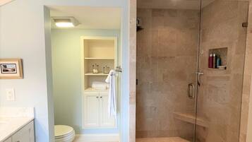 Combined shower/bathtub, hair dryer, towels, soap