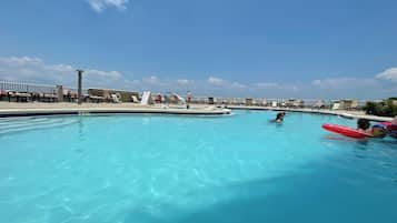 A rooftop pool, a heated pool
