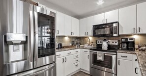 Fridge, microwave, oven, stovetop - **Shore 2 Please** 3/3 Luxury Condo**5 ⭐️ Reviews**Sleeps 8 (Panama City Beach)