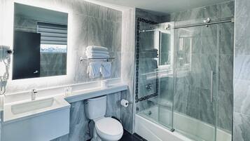 Shower, free toiletries, hair dryer, towels