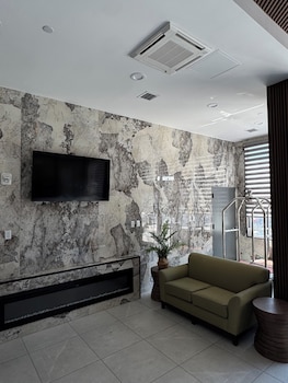 Sitting area in hotel lobby at Capital Hotel