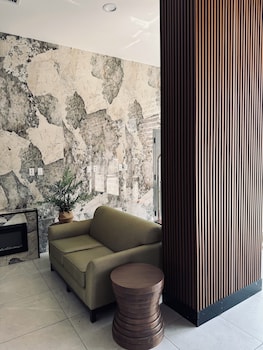 Sitting area in hotel lobby at Capital Hotel