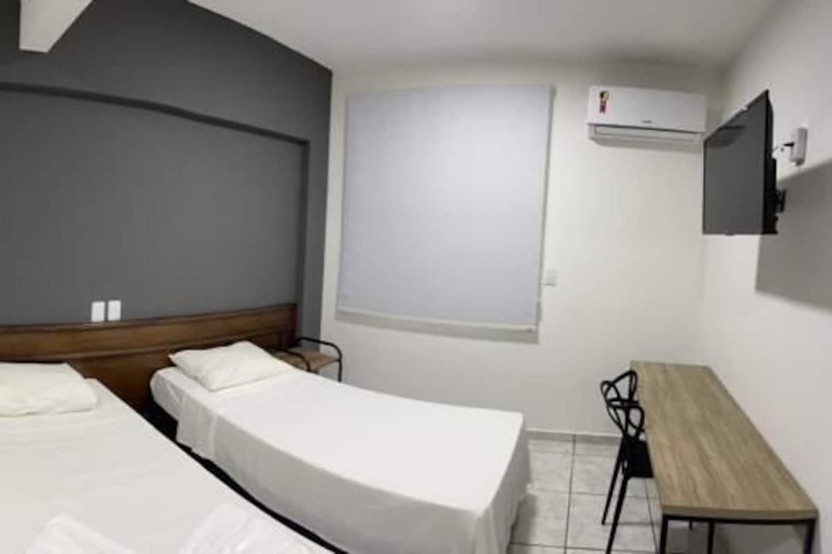 Economy Triple Room | Minibar, free WiFi, bed sheets
