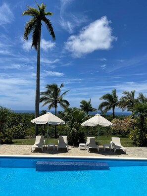 Outdoor pool, a heated pool - Elegant & Spacious Villa with Breathtaking Ocean Views (Sosúa)